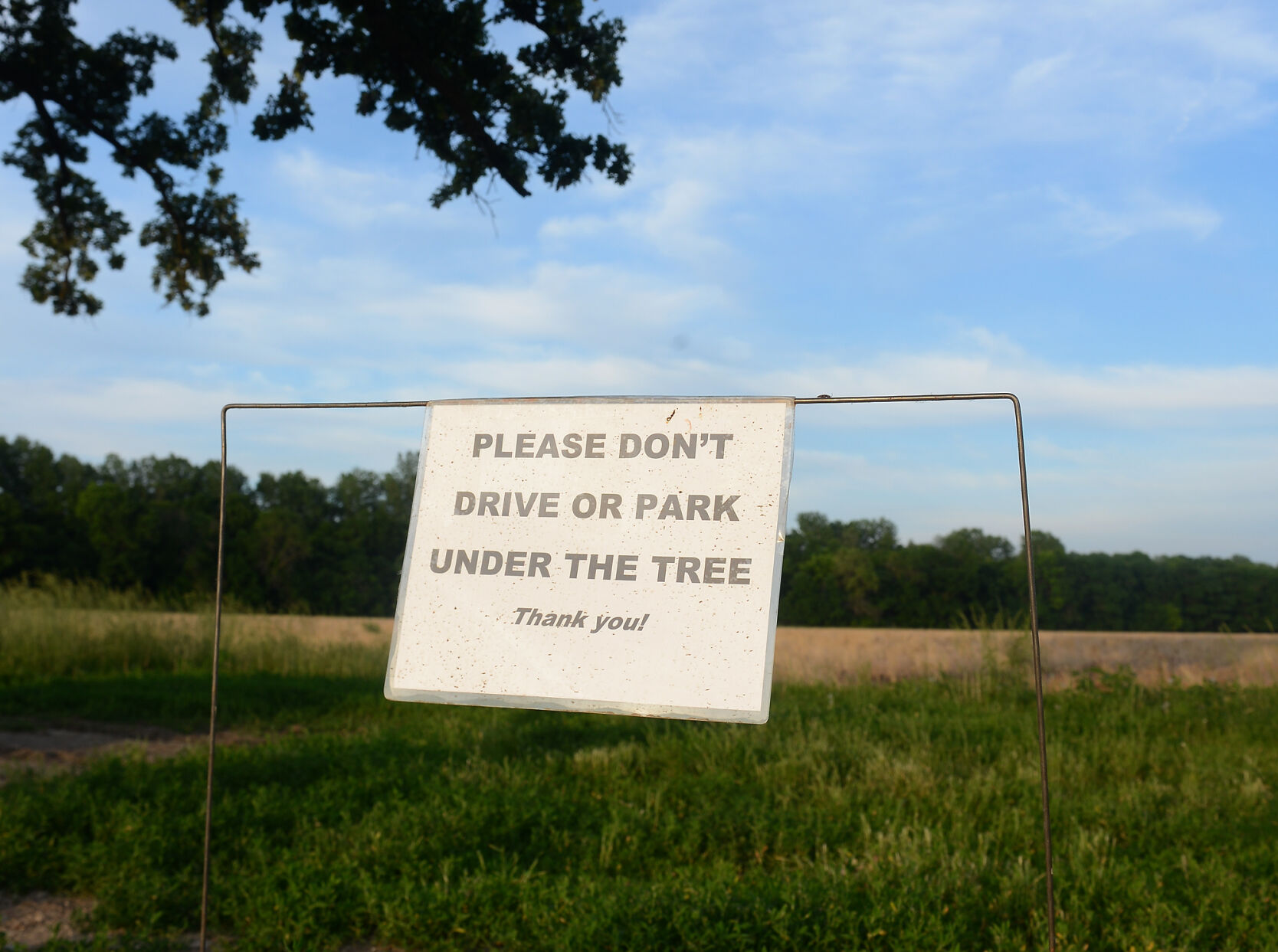 A sign advises against parking